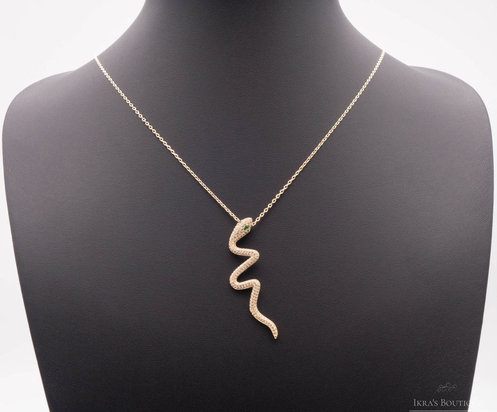 Gold ummantelte Curly Snake Halskette - Ikra's Boutique