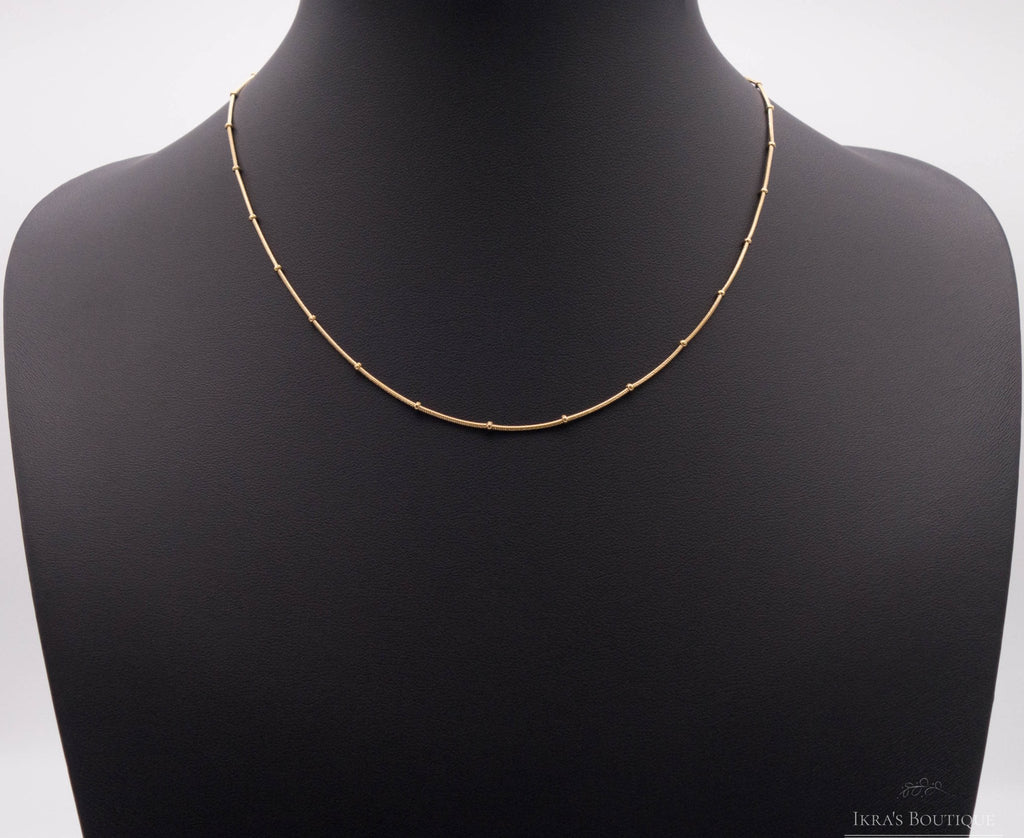 Gold ummantelte Snake Skin Pellet Halskette - Ikra's Boutique